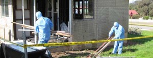 Photo of some of the CCS team working on an asbestos strip job